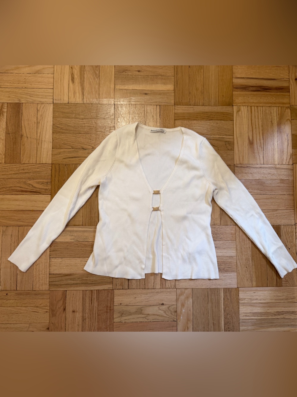 Abercrombie & Fitch Cream Ribbed Long-Sleeve Top with gold clasp